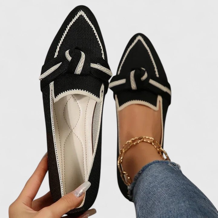 Nova pointed-toe loafers in light blue colorway, front three-quarter view
