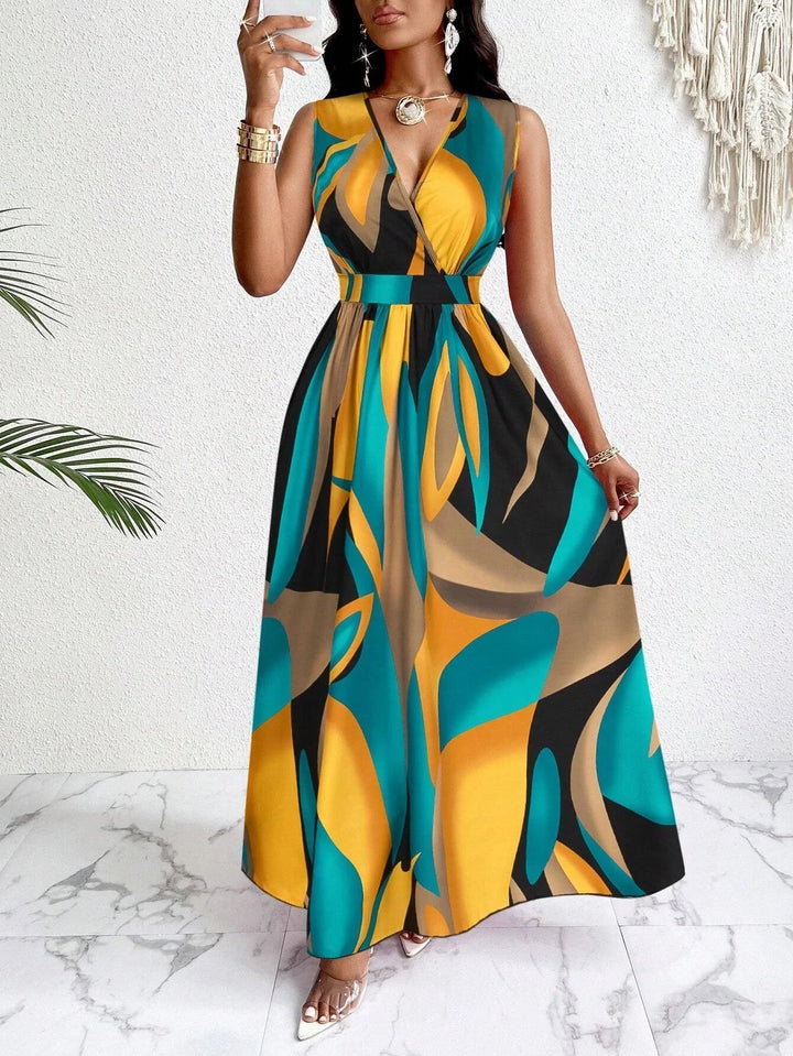 Woman wearing the Nova sleeveless V-neck maxi dress in a teal, yellow, and black abstract brushstroke print with a fitted waist and flared skirt
