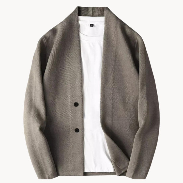 Man wearing a grey casual button-up vest over a t-shirt, styled for a relaxed everyday look
