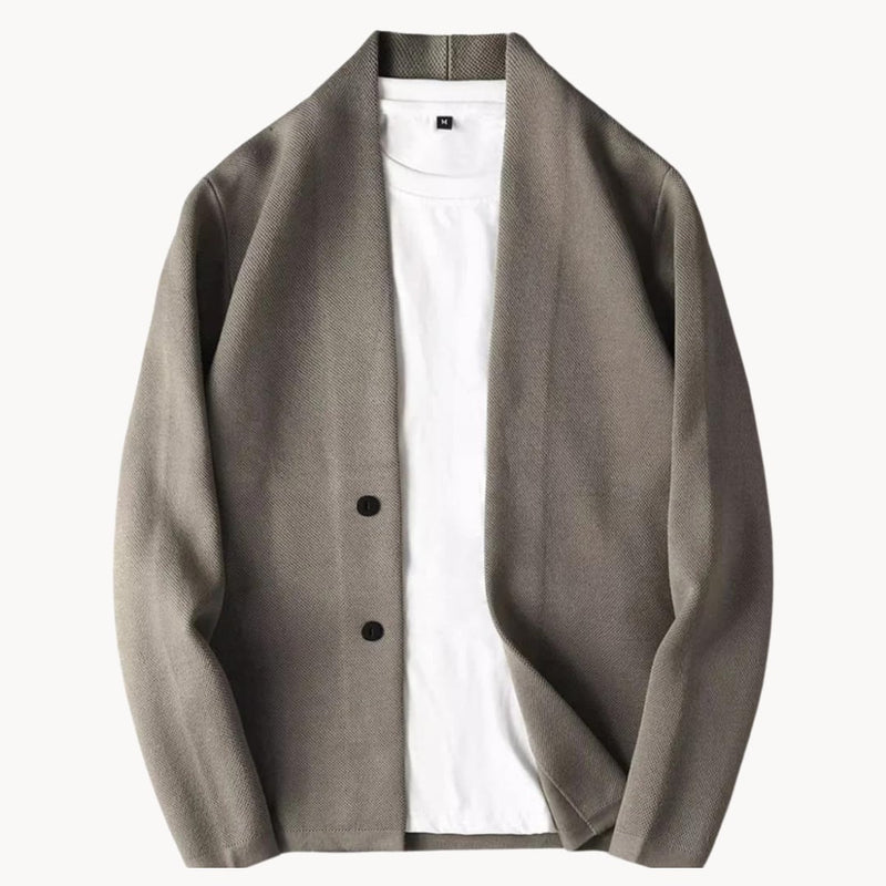 Man wearing a grey casual button-up vest over a t-shirt, styled for a relaxed everyday look