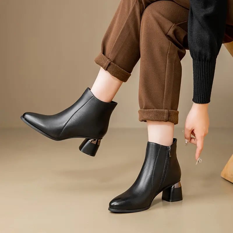 Close-up of Nyla boot toe and supportive sole in black