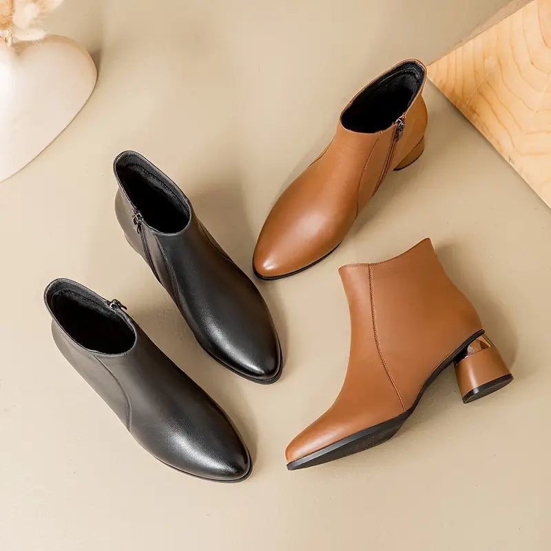 Nyla women's boots in brown styled with a midi skirt for an everyday look