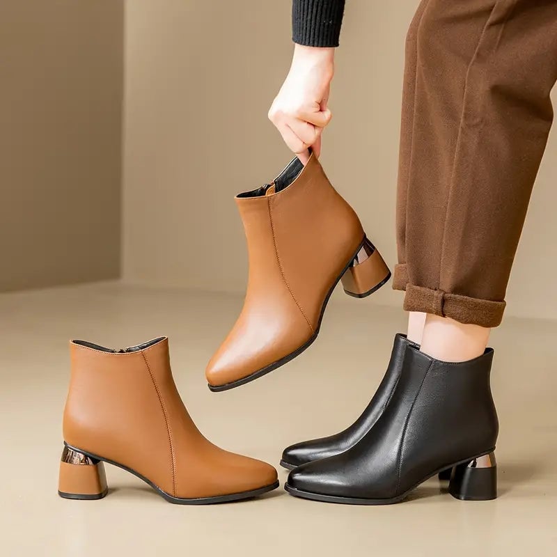 Nyla boots in black and brown colorways displayed side by side