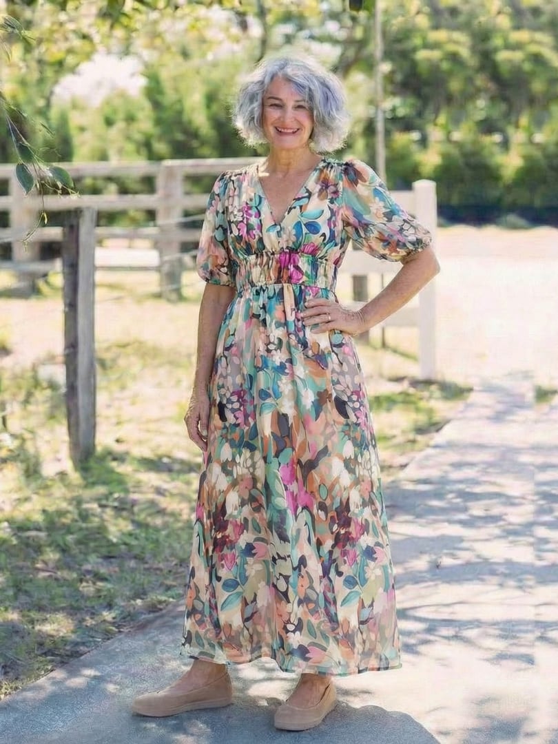 Full-length back view of the Octavia floral V-neck midi dress styled with sandals for a summer look