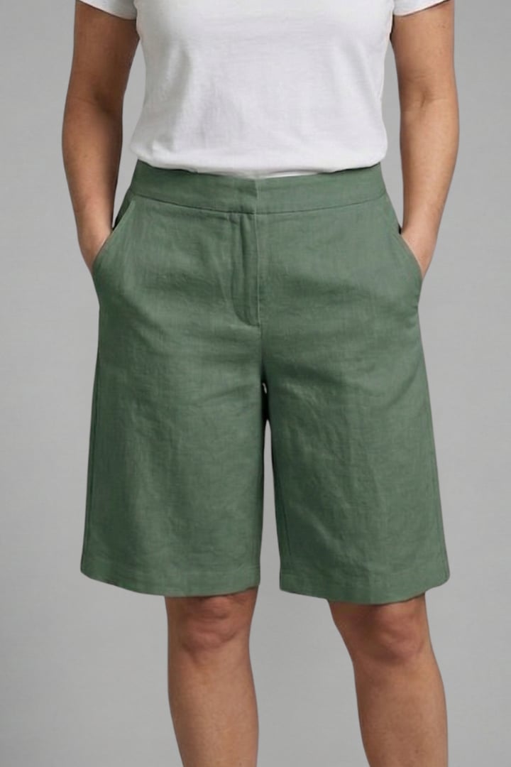 Octavia shorts in white, side view highlighting pocket and silhouette