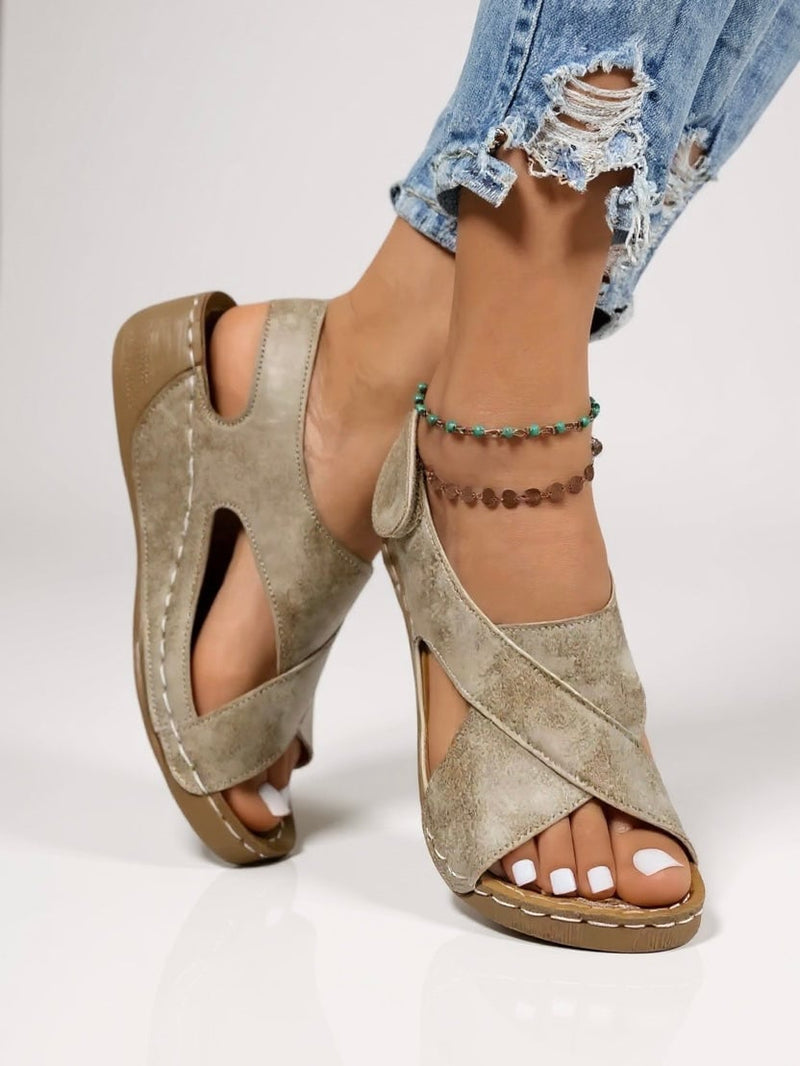 Side profile of Olive platform wedge sandals highlighting the stable wedge heel