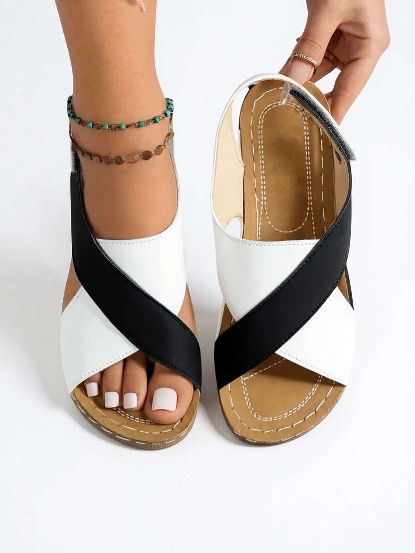 Pair of Olive platform wedge sandals in light brown arranged side by side
