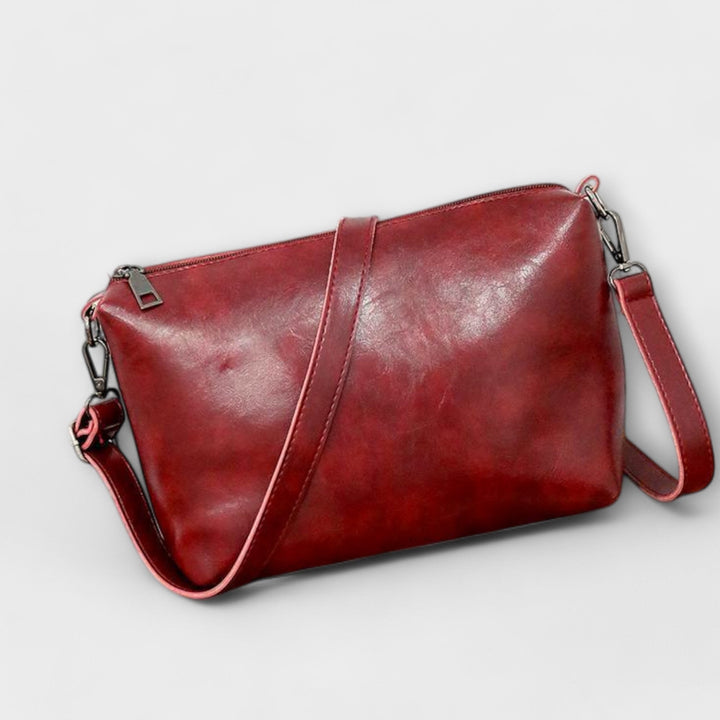 Close-up of vintage-inspired textured exterior of the Olivia shoulder bag in black