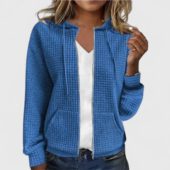 Woman wearing the Olivia elegant cardigan in a flowing drape style, showcasing a flattering silhouette