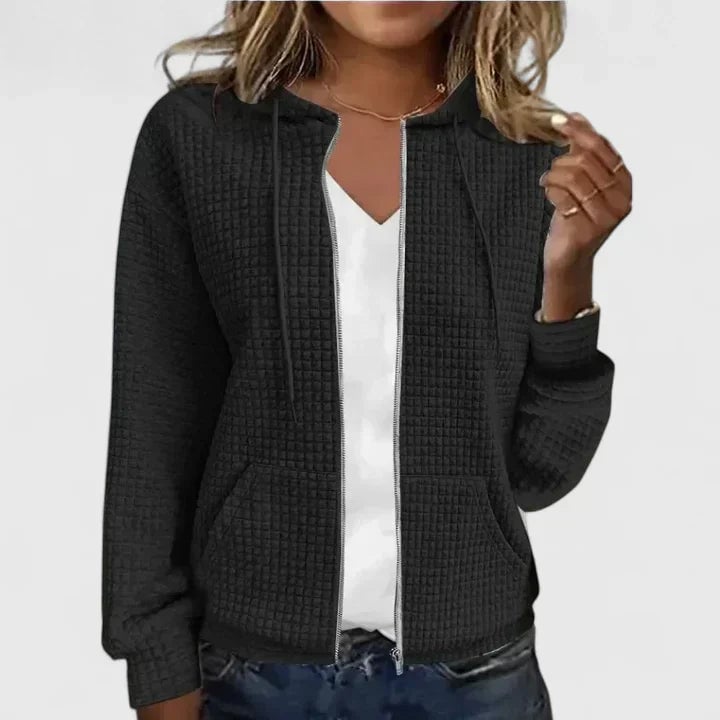 Close-up of the Olivia elegant cardigan highlighting its lightweight, breathable fabric and polished finish