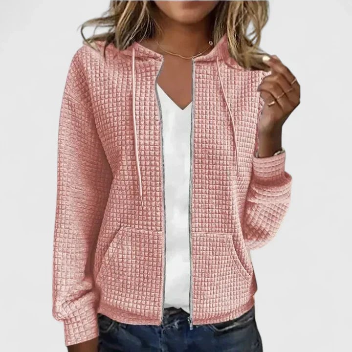Front view of the Olivia elegant cardigan styled over a simple outfit for an effortless layered look
