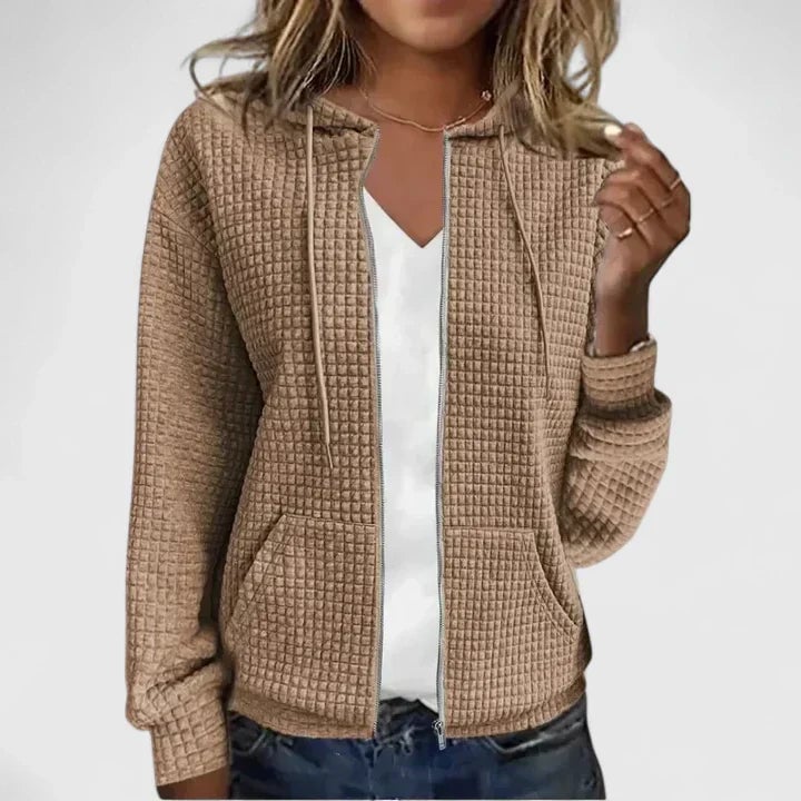 Side profile of the Olivia elegant cardigan showing the smooth, slimming drape over the midsection