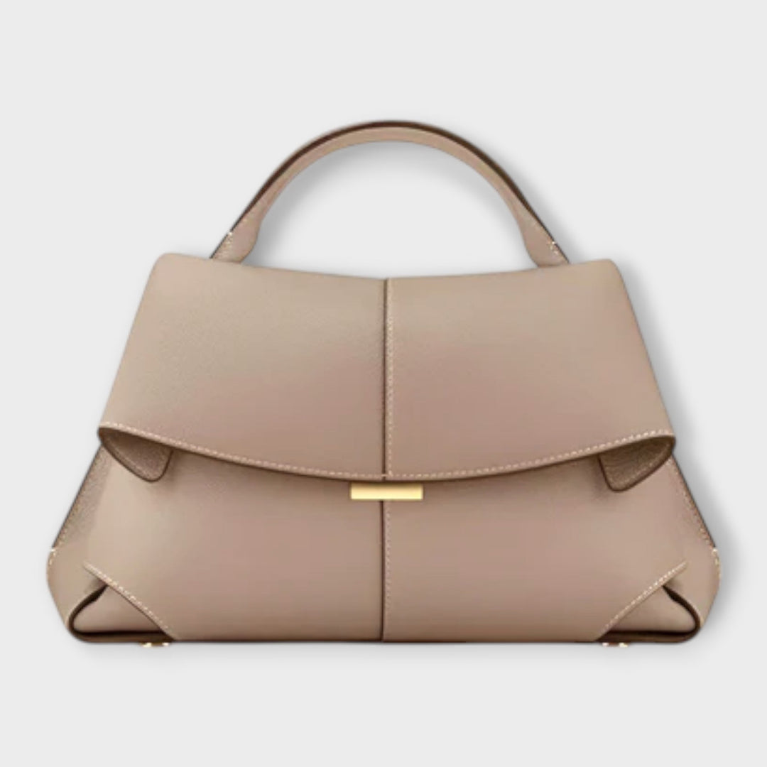 Olivia Luxurious Handbag in Beige displayed against a clean background highlighting its structured shape