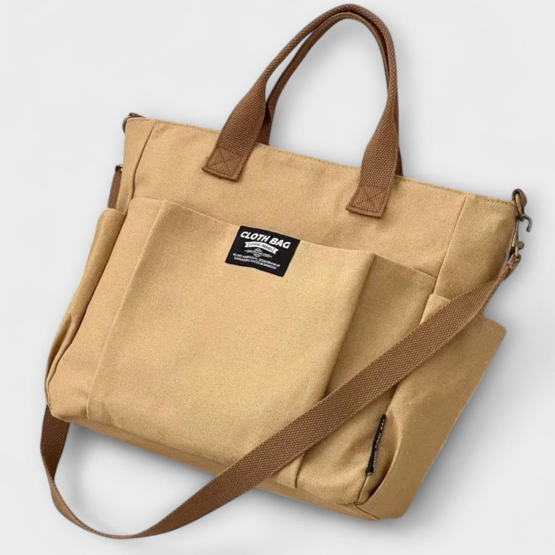 Close-up of Olivia Shoulder Bag hardware and adjustable strap detail