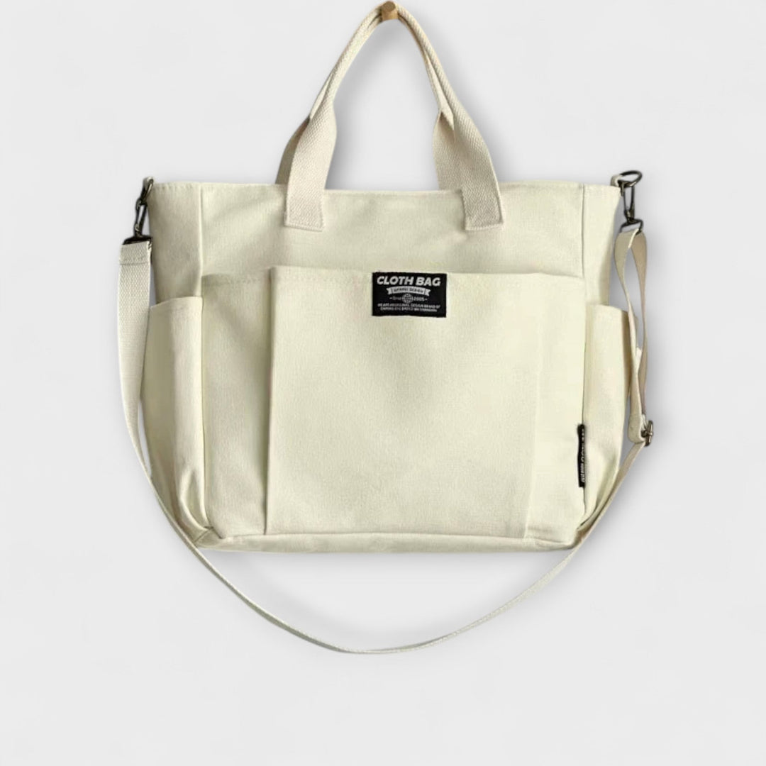 Olivia Shoulder Bag interior view showing spacious compartments and pocket layout