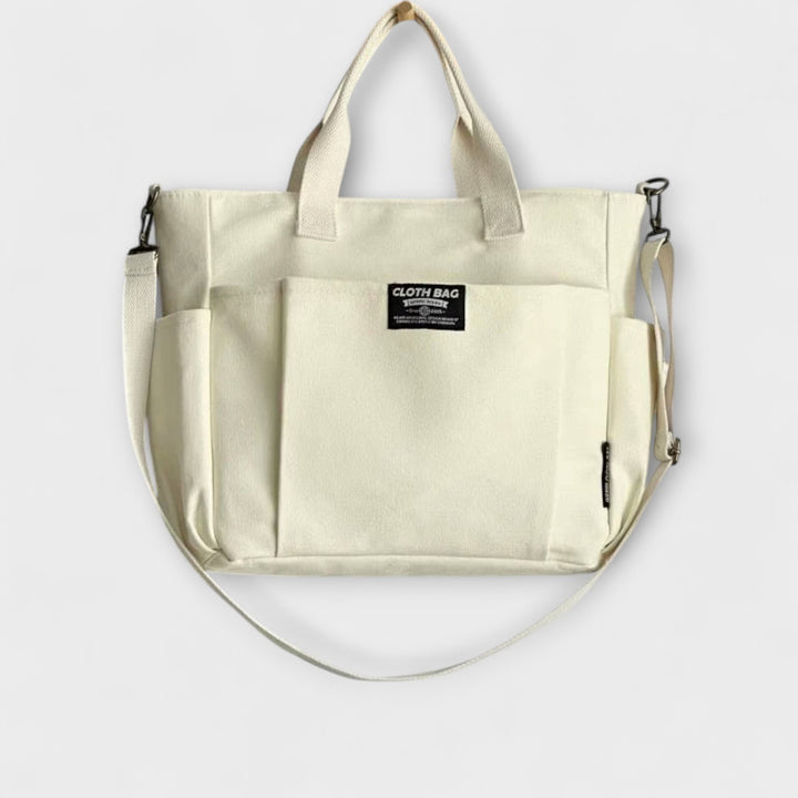 Olivia Shoulder Bag interior view showing spacious compartments and pocket layout