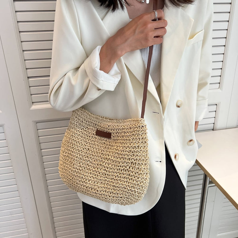 Olivia shoulder bag in brown displayed against a neutral background