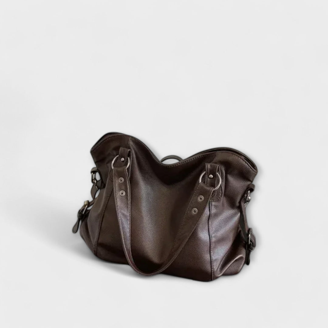 Olivia shoulder bag in all four colors — beige, black, khaki, and brown — arranged together