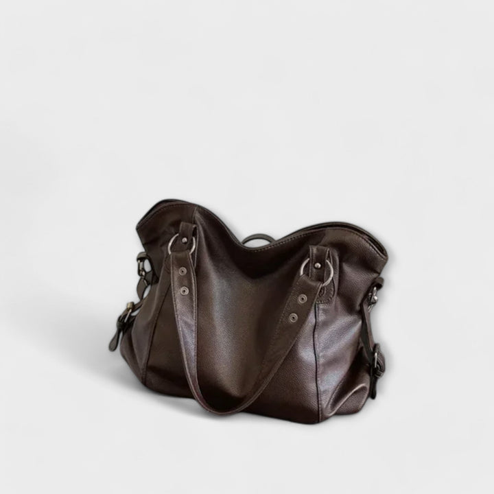 Olivia shoulder bag in all four colors — beige, black, khaki, and brown — arranged together