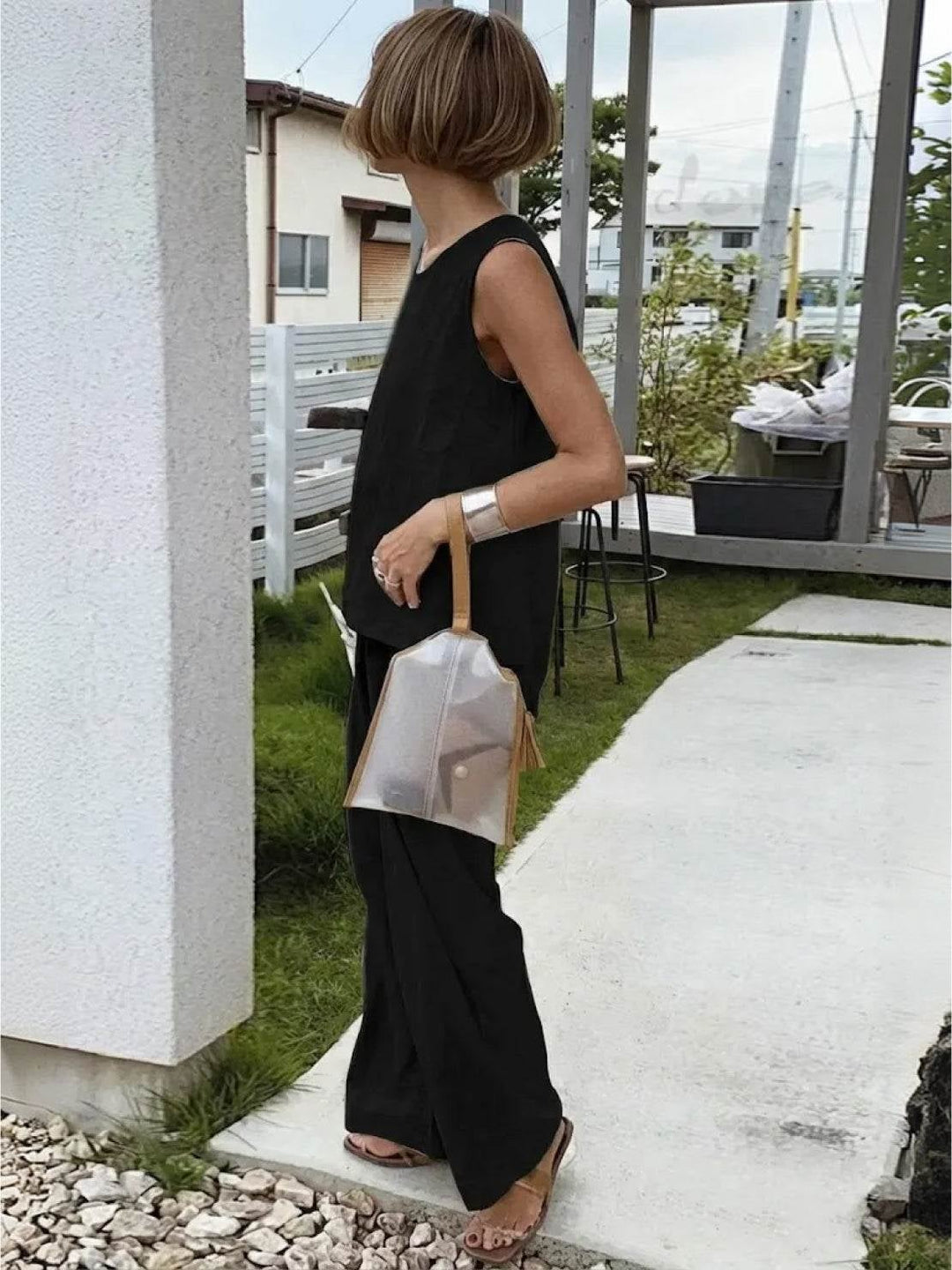 Close-up of crew neck tank top in black from the Olivia set