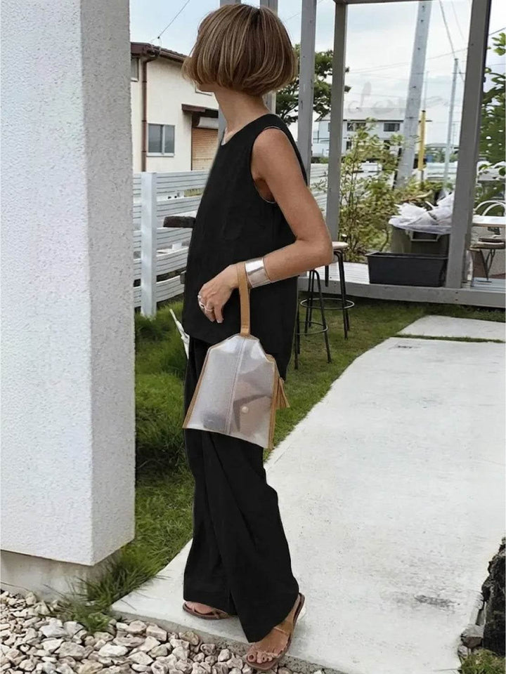 Close-up of crew neck tank top in black from the Olivia set
