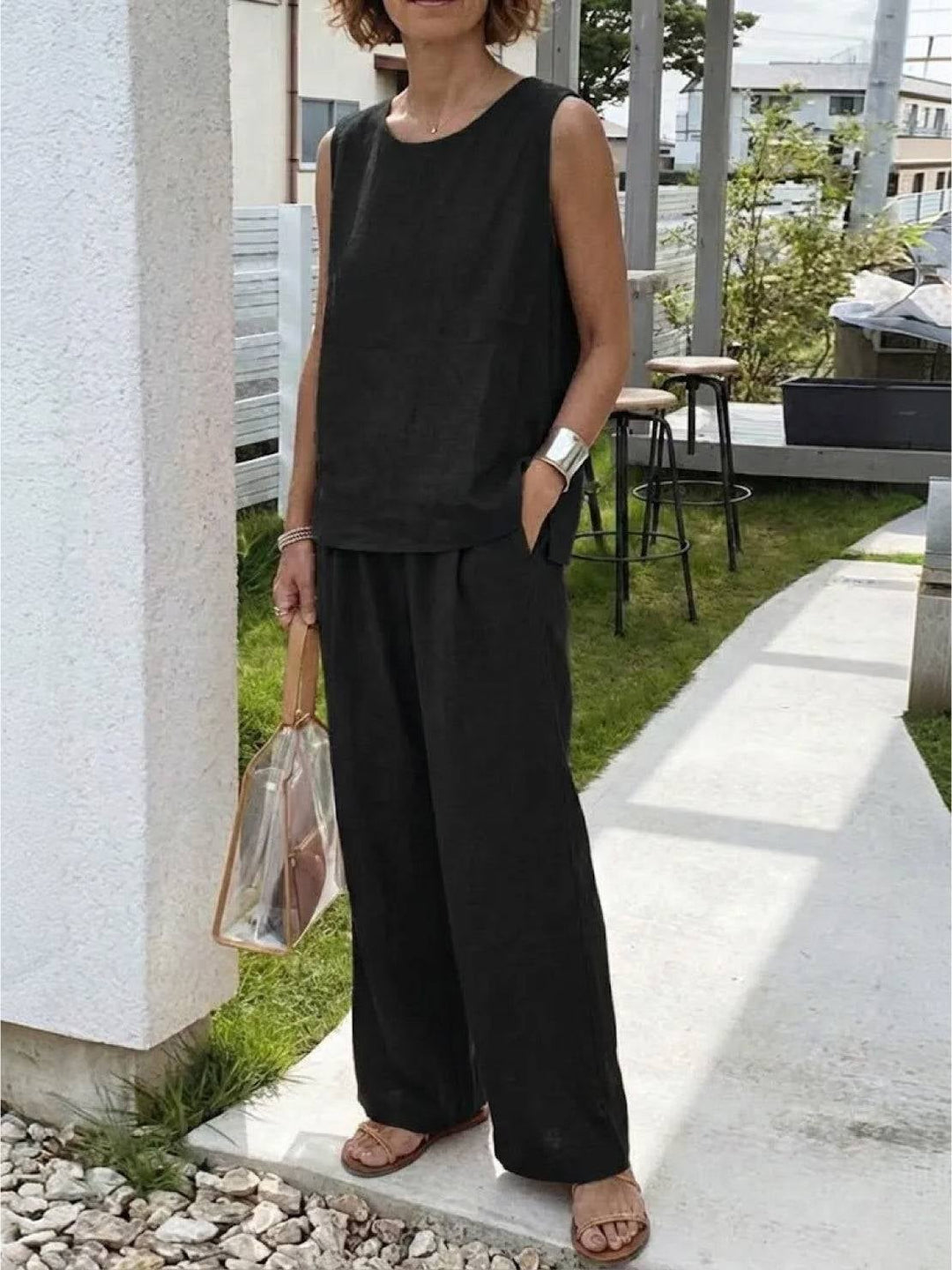 Wide-leg pants detail in black from the Olivia two-piece set