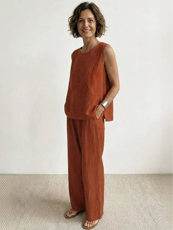 Wide-leg pants detail in rusty orange from the Olivia two-piece set