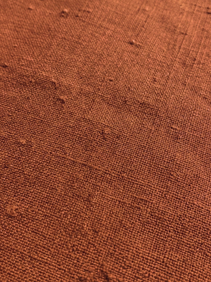 Olivia two-piece set in rusty orange showing tonal co-ord styling