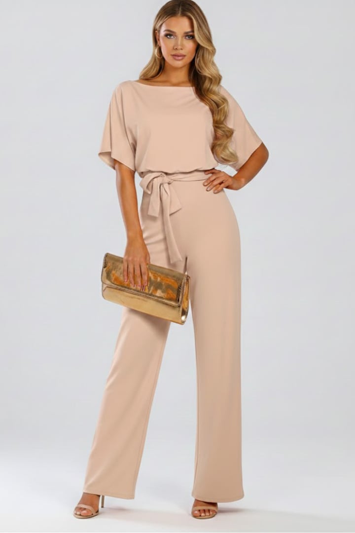 Close-up of the tie belt detail on the Oona wide leg jumpsuit in beige