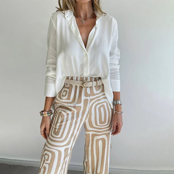 Model styled in the Opal two-piece set in gray with heels for an evening look
