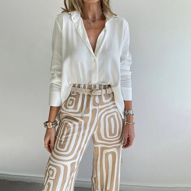 Model styled in the Opal two-piece set in gray with heels for an evening look