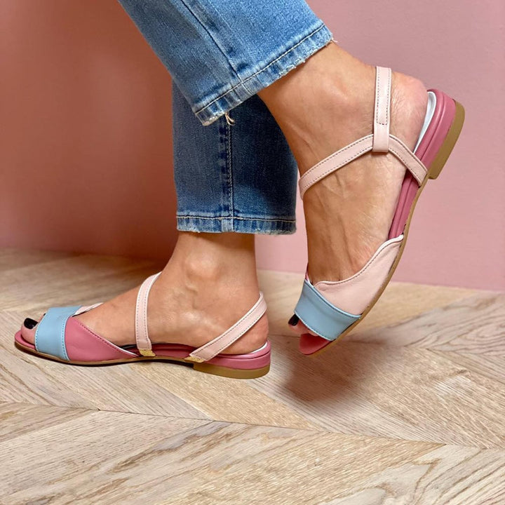 Top-down view of Ophelia women's flat walking sandals in mixed pink tones