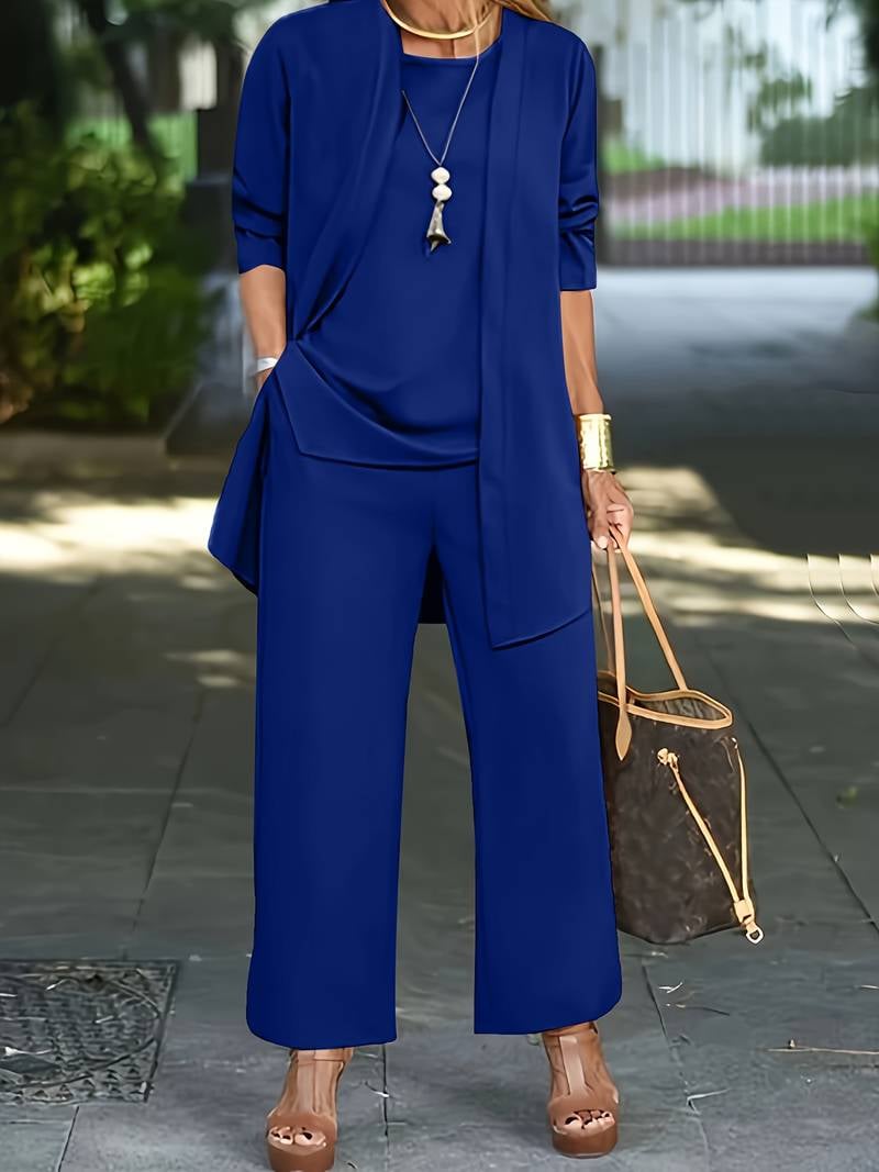Side view of the Ophira long sleeve 3-piece set highlighting the flowing wide-leg silhouette