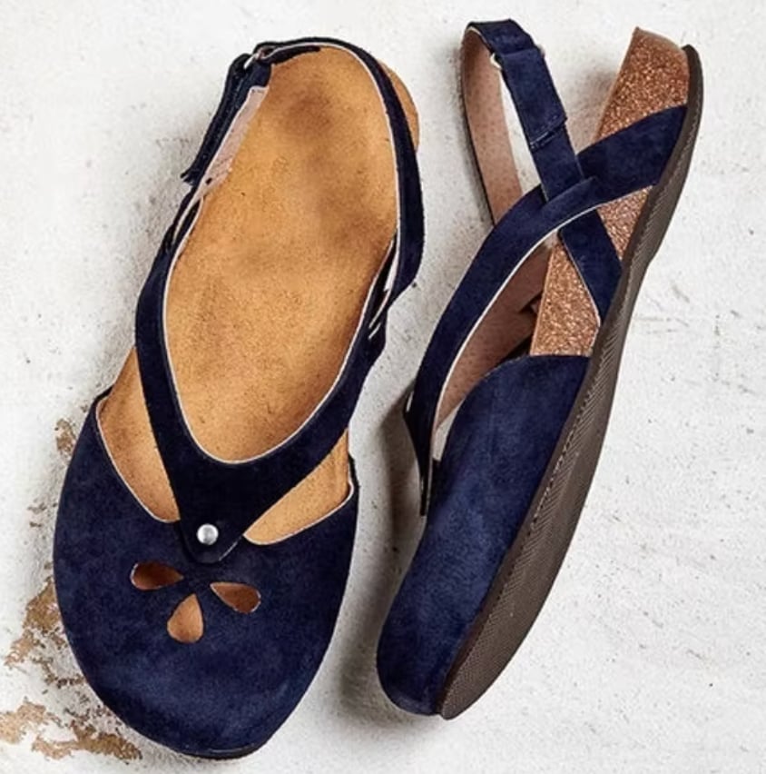 Side profile view of the Orchid sandal highlighting its featherweight construction and clean modern silhouette