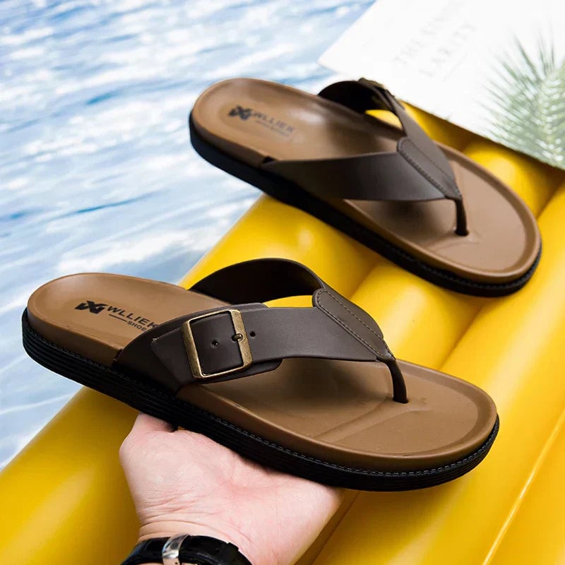 Orla vegan leather sandals in black shown from the side highlighting the lightweight flexible sole