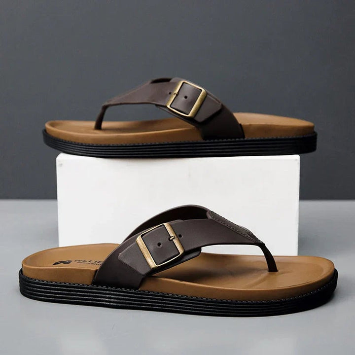 Orla vegan leather sandals in brown displayed from the front on a clean white background