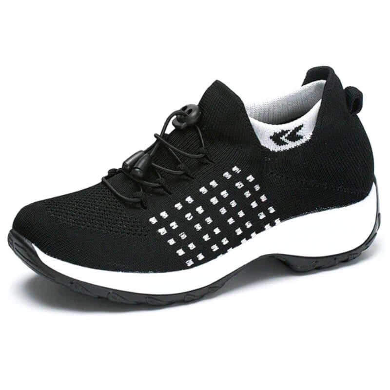 Black and white women's orthopedic shoes showing cushioned insole detail