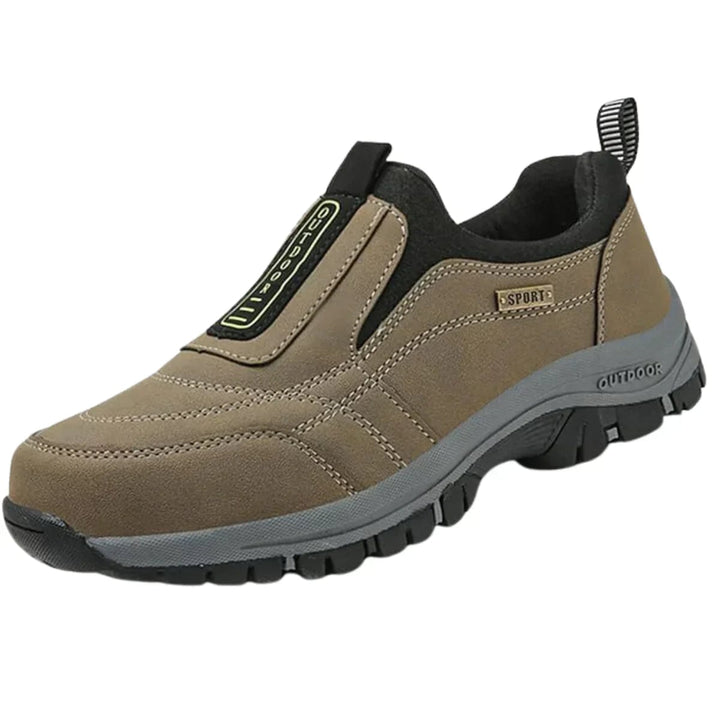 Orthopedic walking shoe in black displayed on neutral background