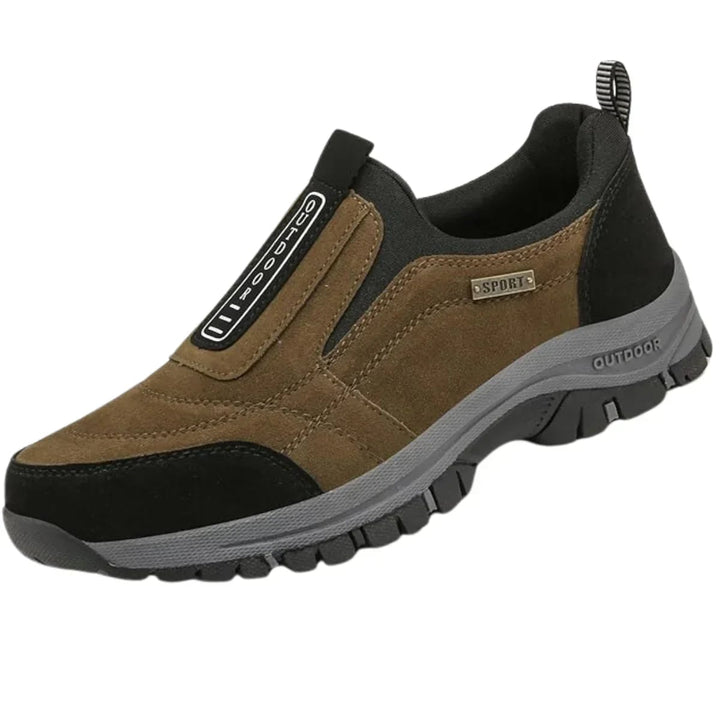 Side profile of men's khaki orthopedic walking shoe highlighting ergonomic sole design