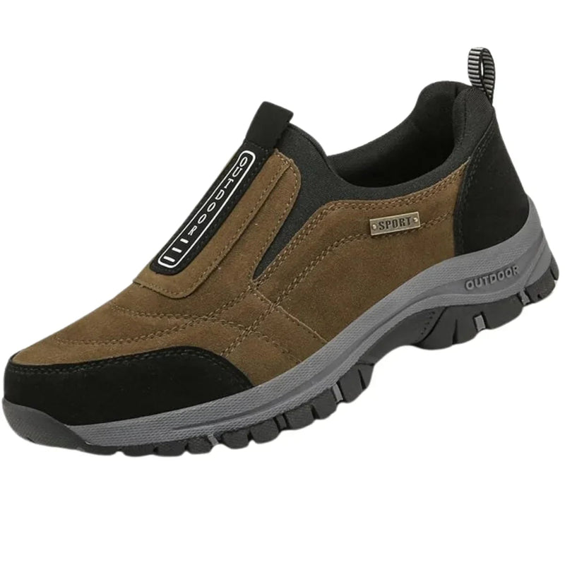 Side profile of men's khaki orthopedic walking shoe highlighting ergonomic sole design