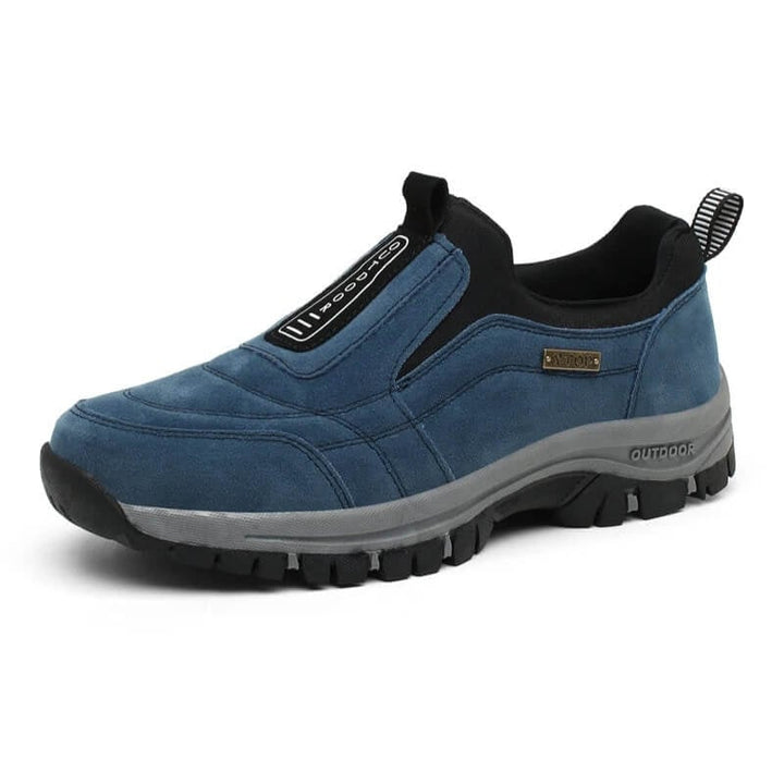 Green orthopedic walking shoe for men on a clean white background