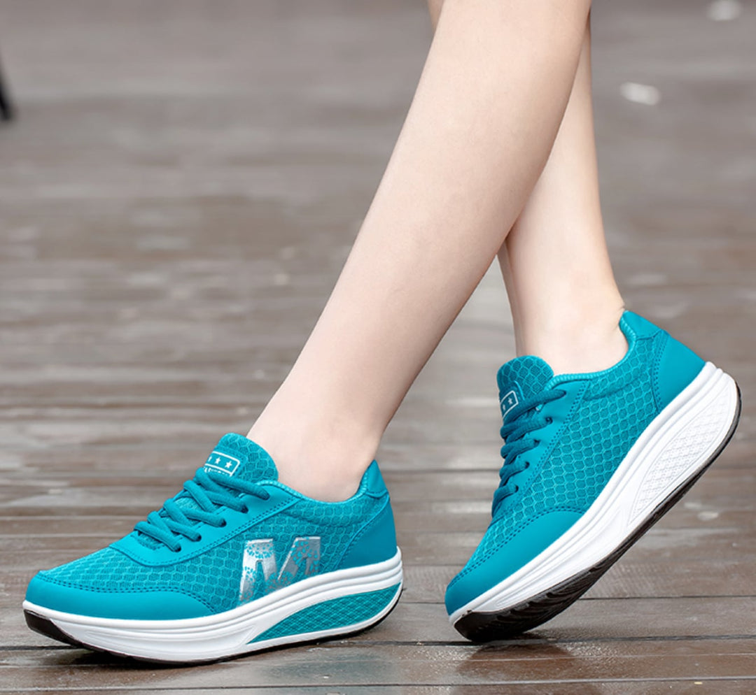 Close-up of the shock-absorbing outsole on the Ottilie women's walking sneaker