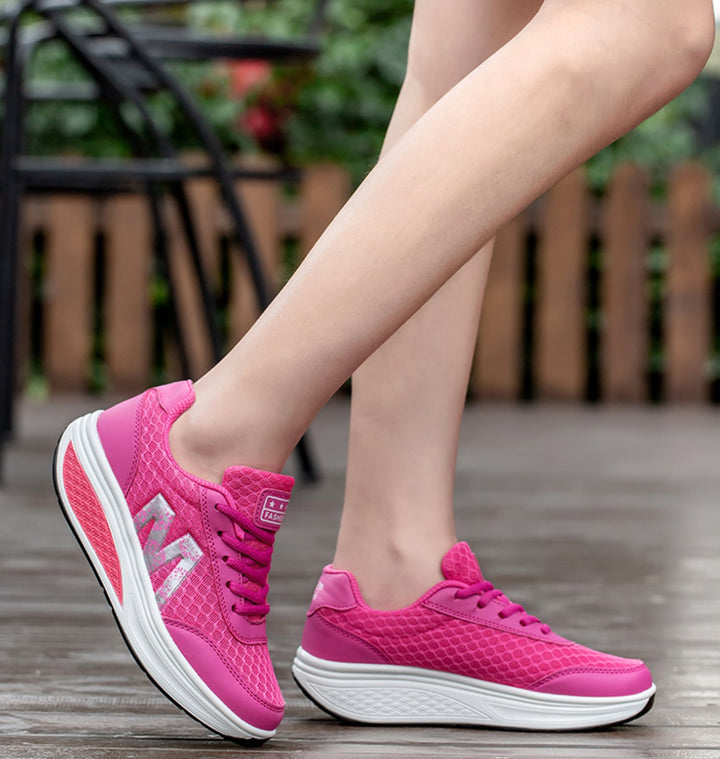 Pair of Ottilie women's sneakers in gray displayed side by side