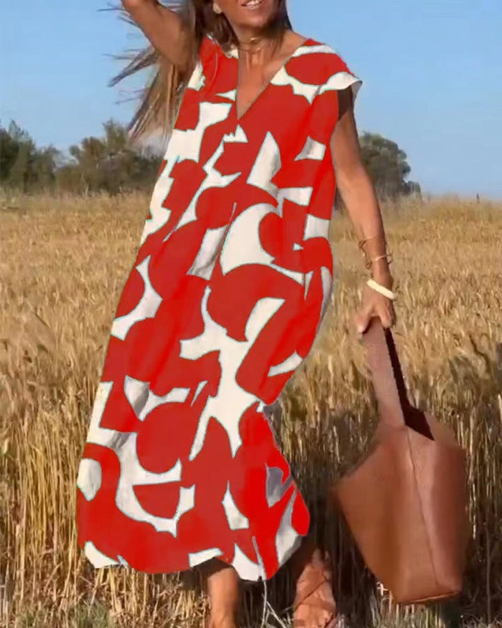 Lifestyle shot of a woman in the Palmer maxi dress outdoors in natural light