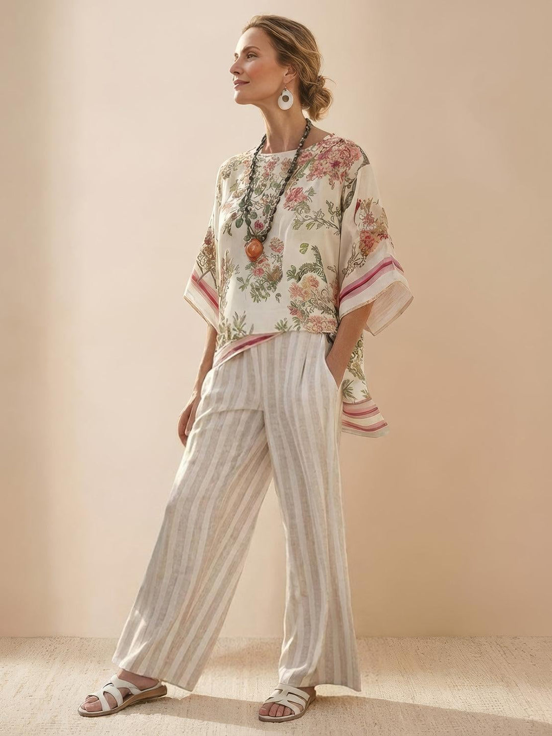 Side view of the Paloma striped co-ord set showing relaxed wide-leg silhouette