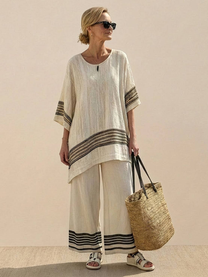 Side view of Paloma Blush Meadow set showing flowing wide-leg pants