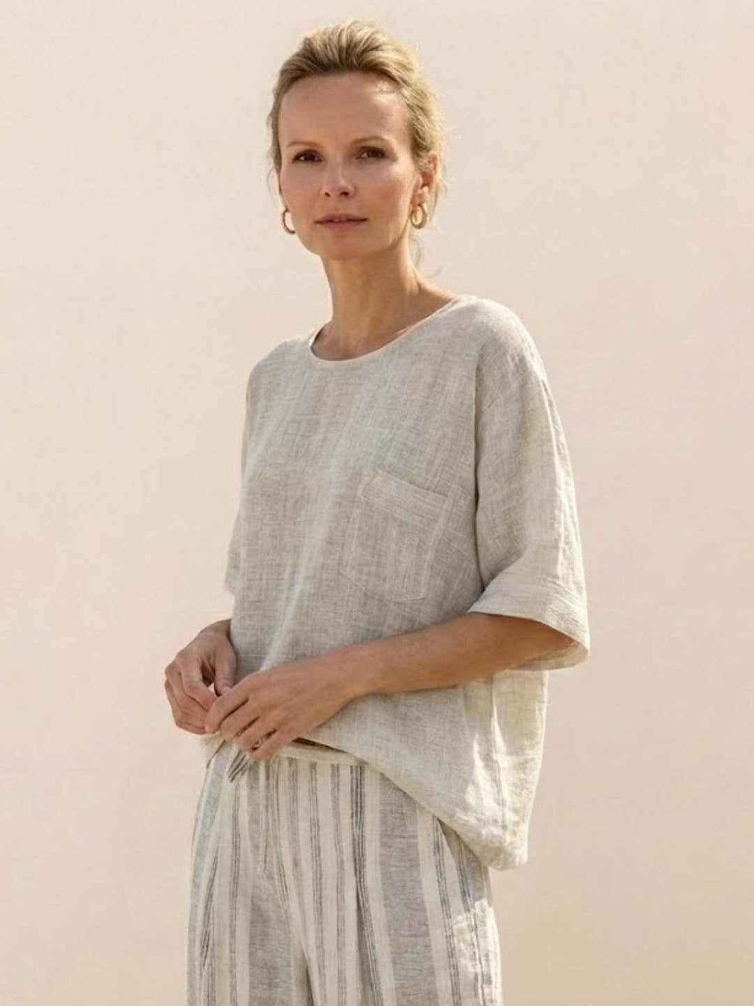 Side view of Paloma Tidal Stripes set showing cropped pant length