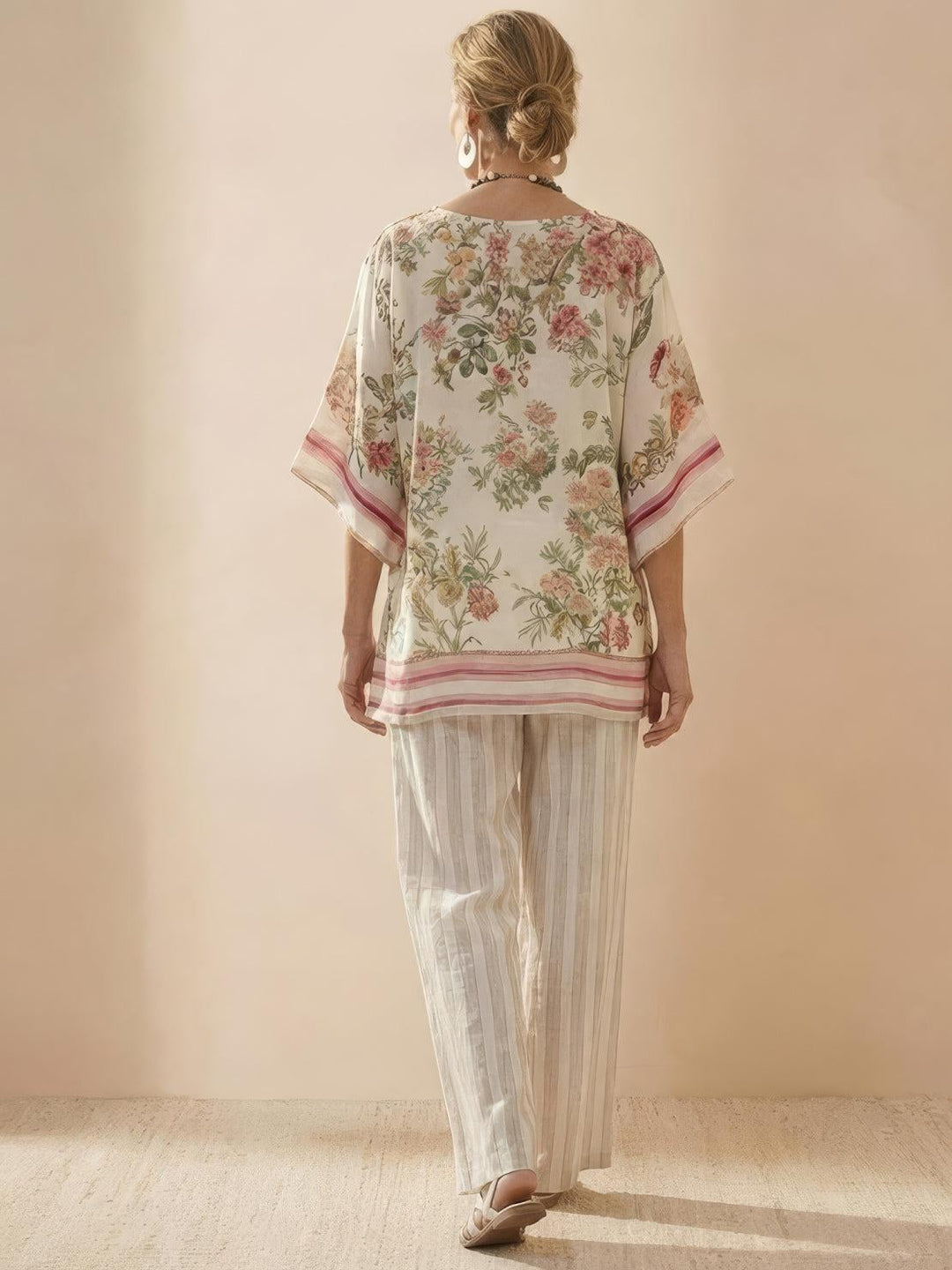 Close-up of Paloma wide-leg pants fabric texture and vertical stripe pattern