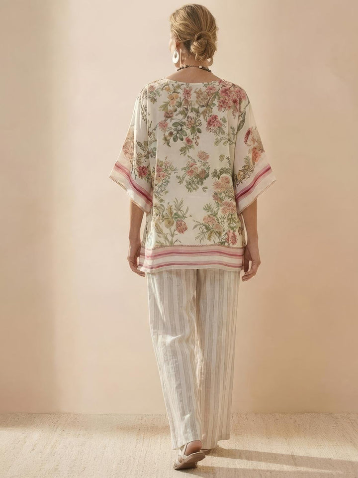 Close-up of Paloma wide-leg pants fabric texture and vertical stripe pattern