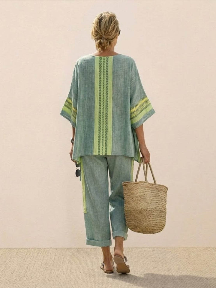 Paloma set styled with a woven tote bag and strappy sandals